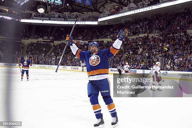 New York Islanders Colin McDonald victorious during game vs Phoenix Coyotes at Nassau Veterans Memorial Coliseum. Uniondale, NY 10/8/2013 CREDIT:...