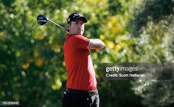 Webb Simpson watches his tee shot on the 16th hole during the second round of the Shriners Hospitals for Children Open at TPC Summerlin on October18,...