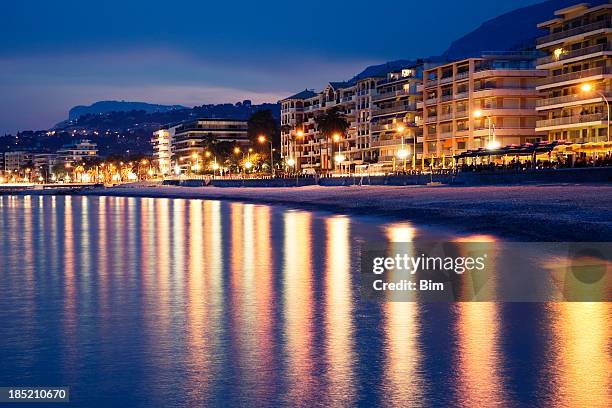 coastal view of menton at dusk, cote d'azur, french riviera - france skyline stock pictures, royalty-free photos & images