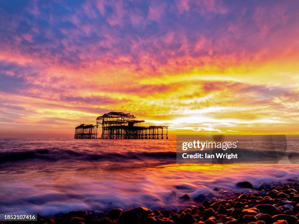brighton pier sunset - australia v england stock pictures, royalty-free photos & images