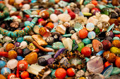 Heap of colorful bright stone jewelry