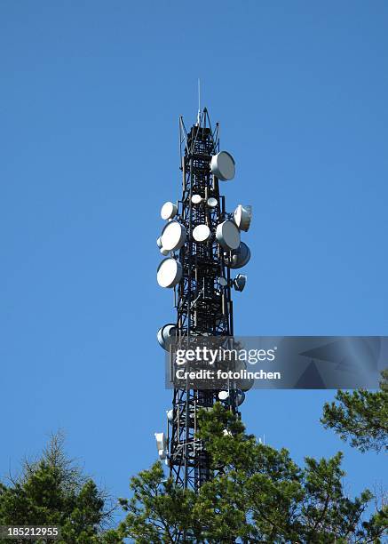 communications tower - funkmast stock pictures, royalty-free photos & images