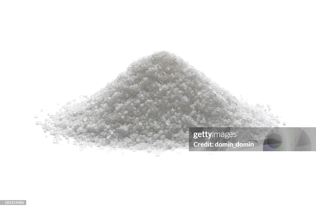 Pile of sugar isolated on white