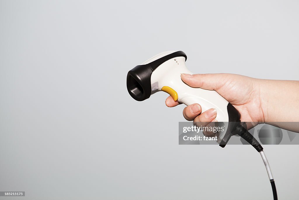 Woman holding a barcode scanner