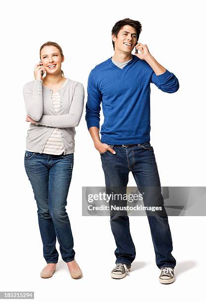 couple on cell phones - isolated - two women on phone isolated stock pictures, royalty-free photos & images