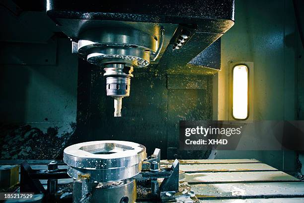 cnc lathe workspace - parts of a milling machine stock pictures, royalty-free photos & images