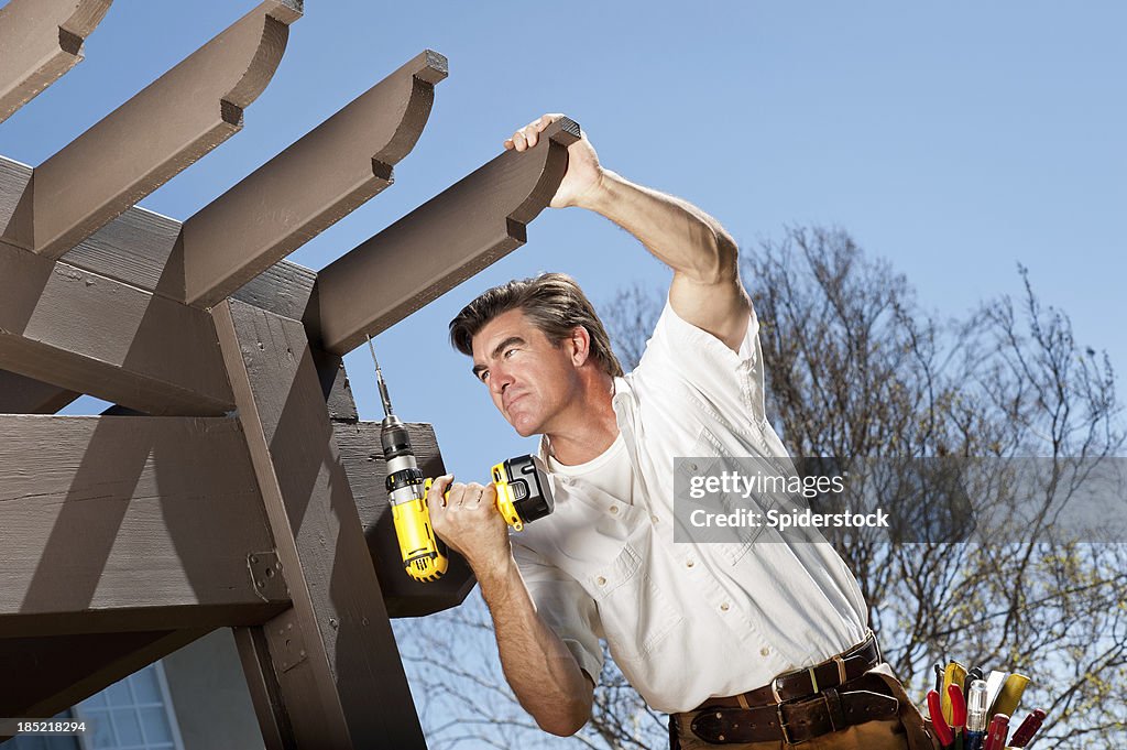 Manitas trabajando con pérgola