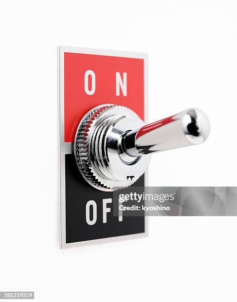 isolated shot of on off switch on white background - schakelaar stockfoto's en -beelden