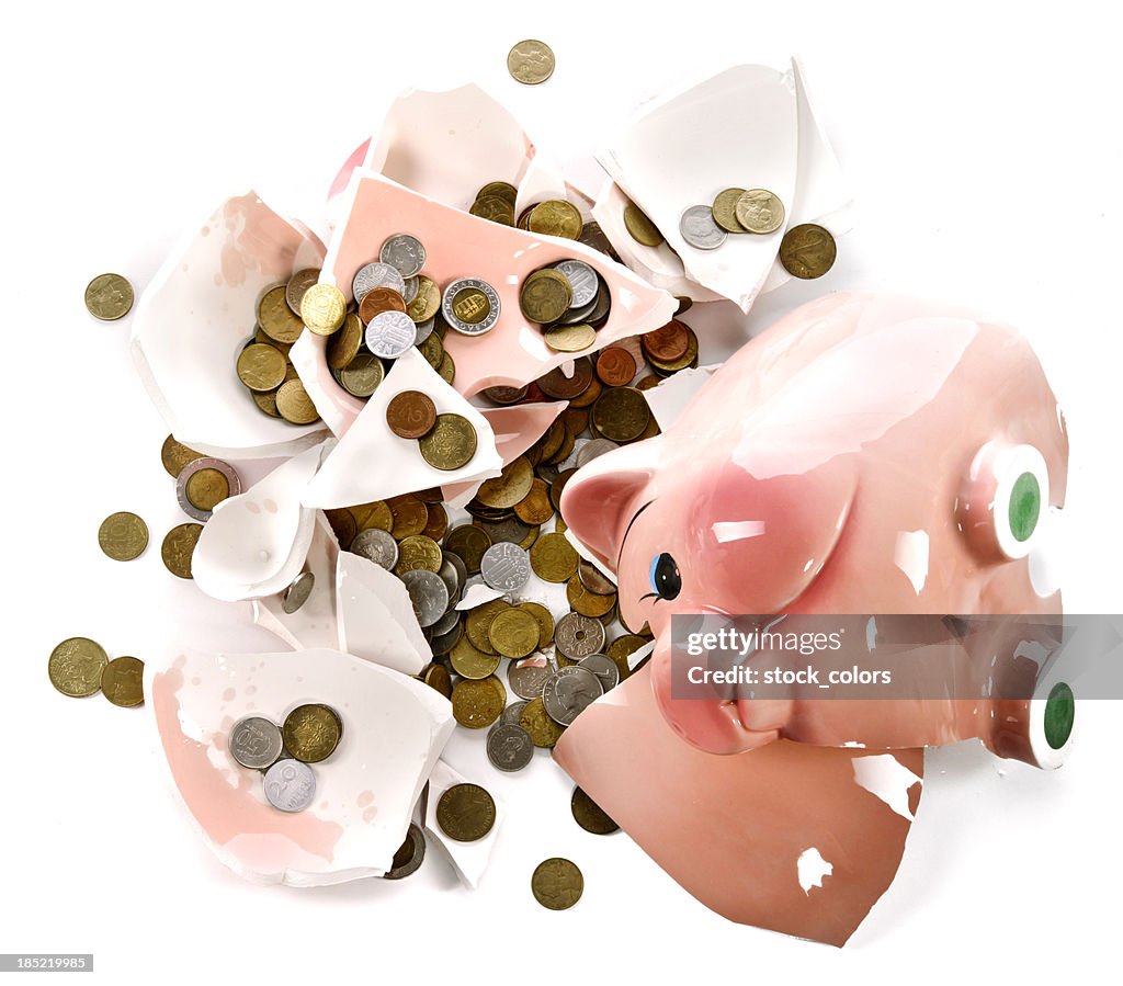 Money and broken piggy-bank