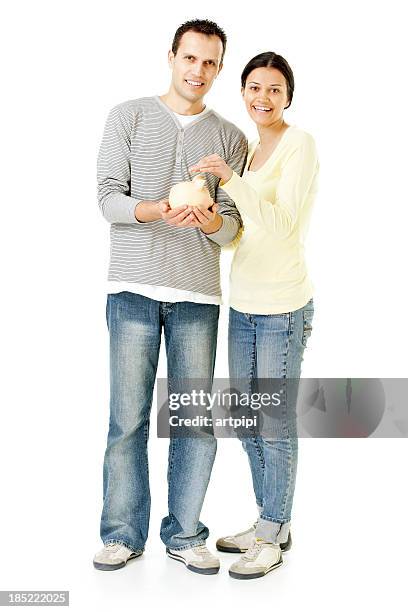 speichern sie zusammen - couple saving piggy bank stock-fotos und bilder