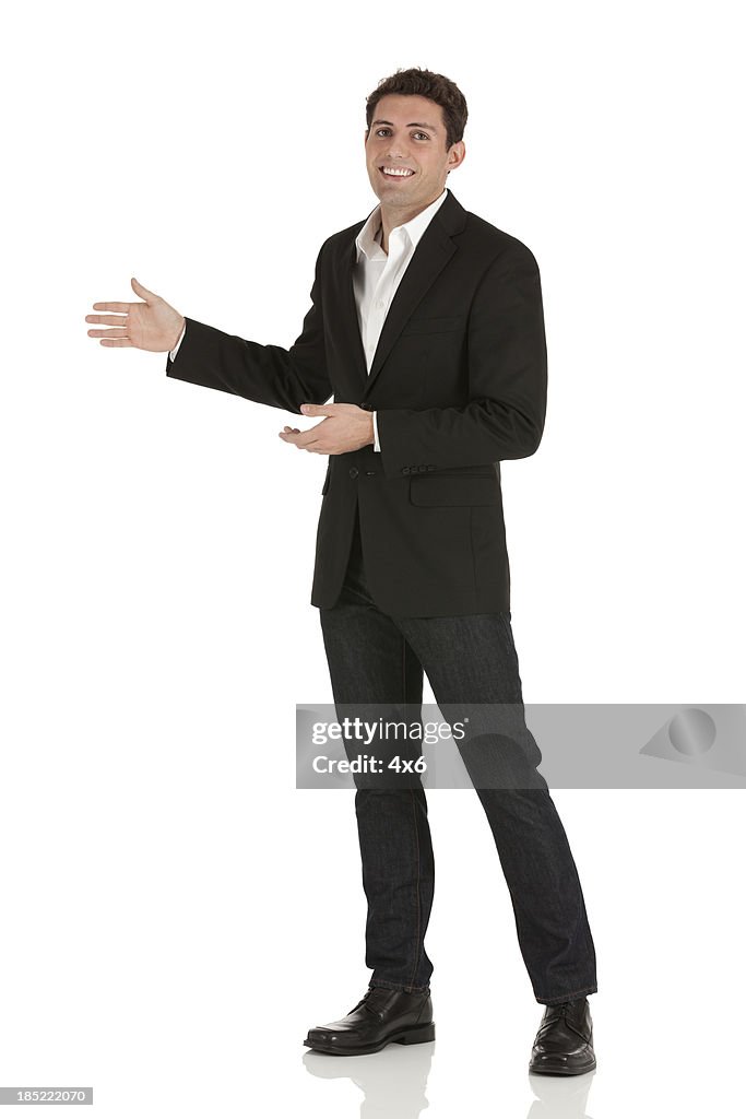Portrait of a happy businessman gesturing