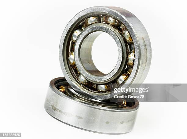 ball bearing over white background - ball bearing stock pictures, royalty-free photos & images