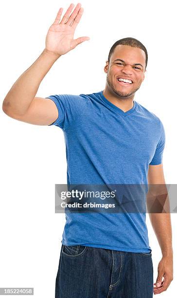 happy young man waving - blue tshirt stock pictures, royalty-free photos & images