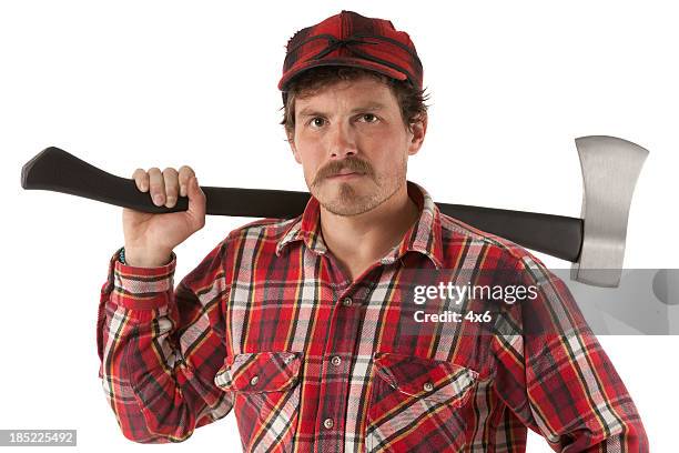 portrait of a lumberjack with an axe - lumberjack stock pictures, royalty-free photos & images