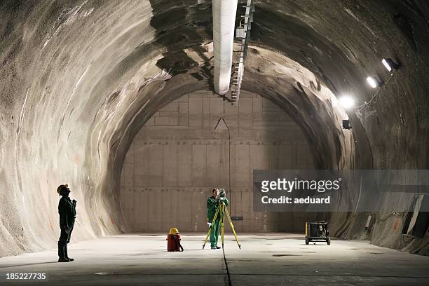 professional underground workers - tunnel construction stock pictures, royalty-free photos & images