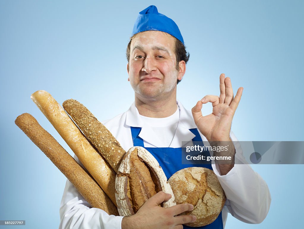 Young Baker Doing A-Okay Hand Signal