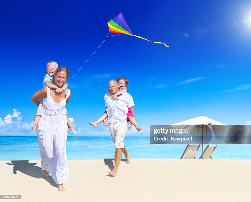 Family having fun on the beach