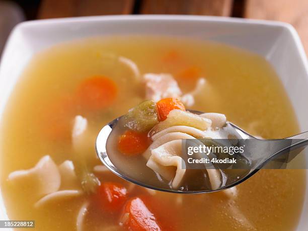 chicken noodle soup - chicken noodle soup stock pictures, royalty-free photos & images