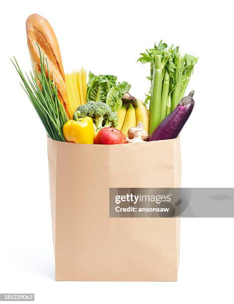 comestibles en bolsa de papel - tote bag fotografías e imágenes de stock