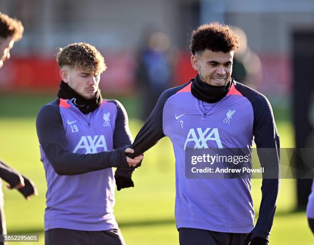 Harvey Elliott and Luis Diaz of Liverpool during a training session at Axa Training Centre on December 13, 2023 in Liverpool, England.