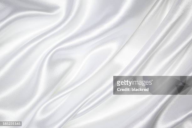 ホワイトのシルクの質感 - サテン　布 ストックフォトと画像