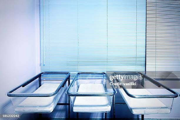 empty baby cots - hospital ward stock pictures, royalty-free photos & images