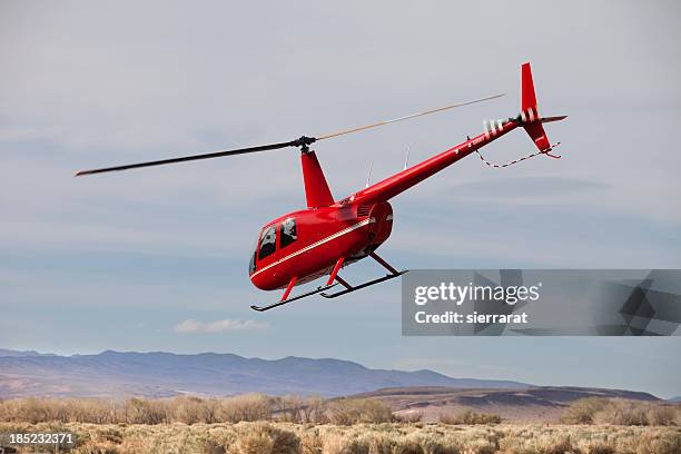 Helicopter R22 Flying 24 Robinson R22 Helicopter Stock Photos, High-Res Pictures, and Images ...