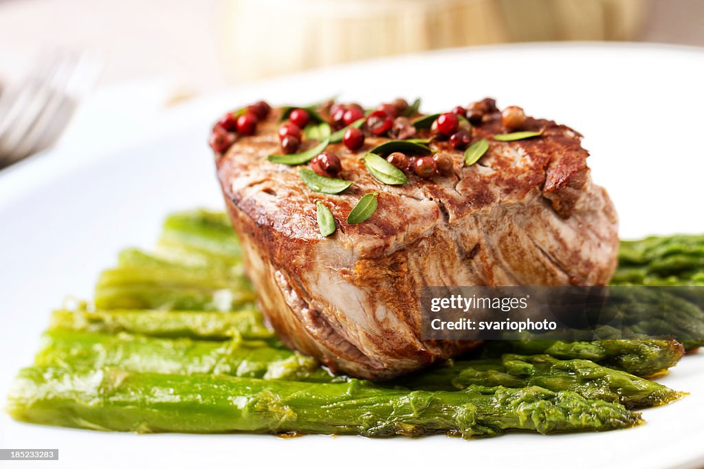 Beef fillet with pink pepper and asparagus