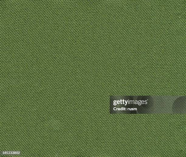 green fabric background - green canvas fabric stock pictures, royalty-free photos & images