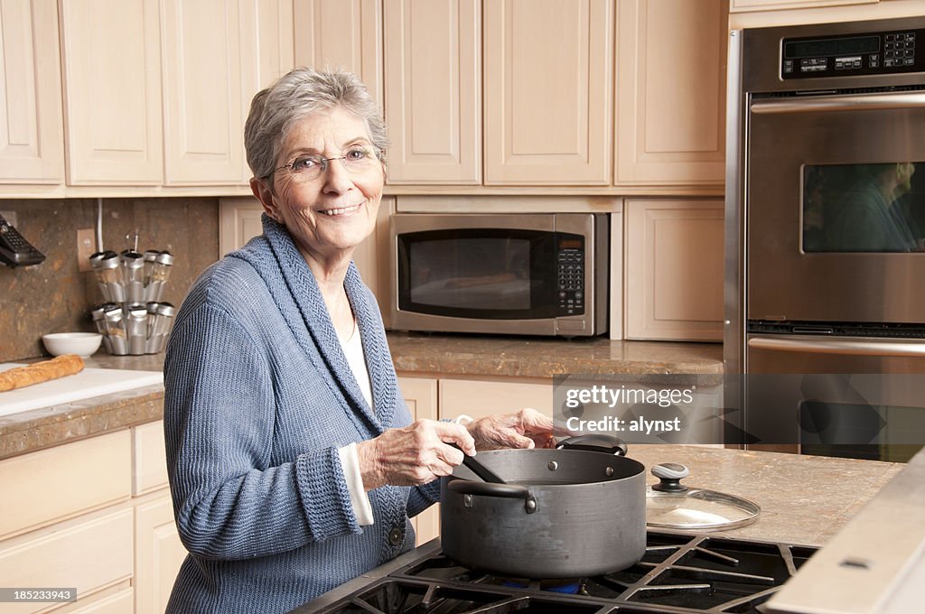 Grandma Cooking In The Kitchen High-Res Stock Photo - Getty Images