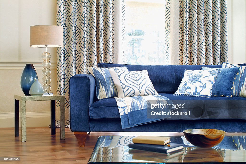 Interior of formal Sofa In Window with cushions