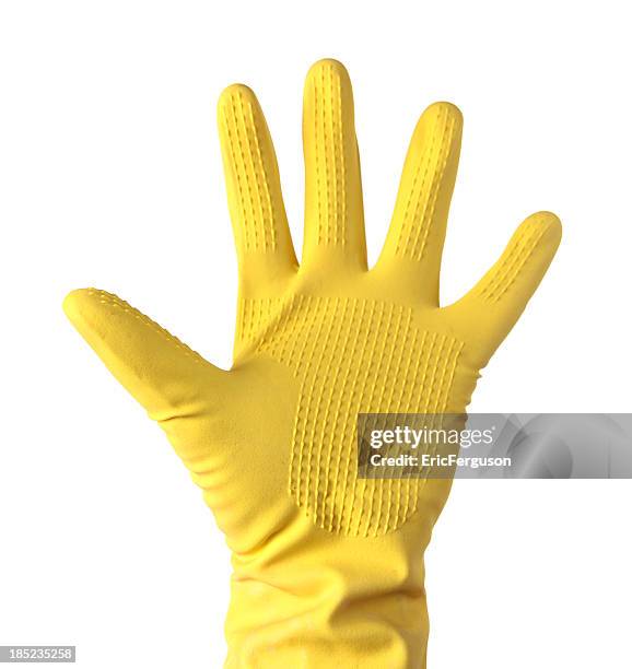 yellow cleaning glove on white - rubber gloves stockfoto's en -beelden