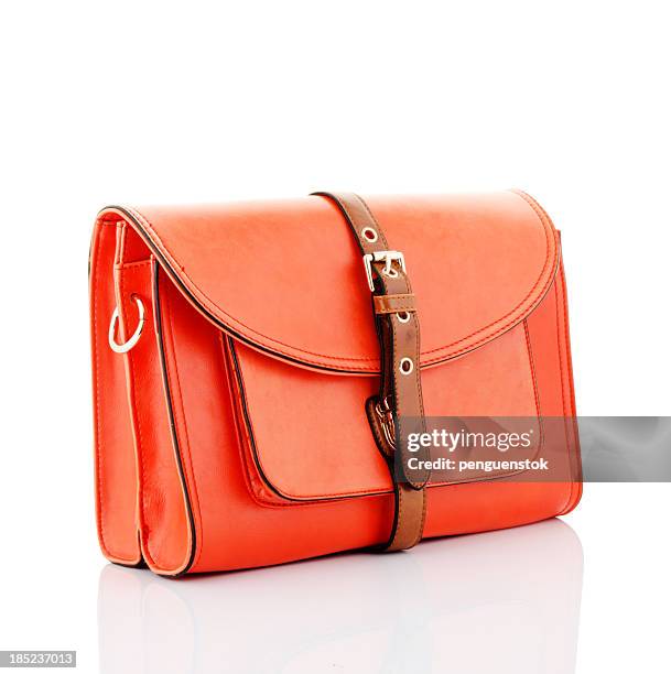 orange handbag - orange purse stock pictures, royalty-free photos & images