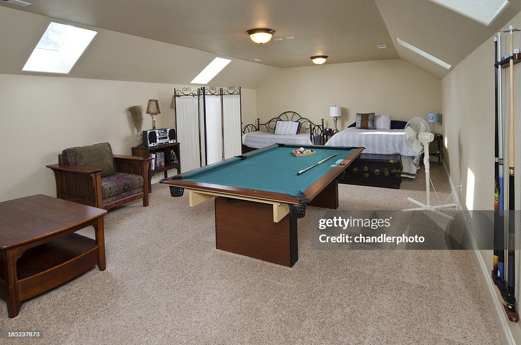 Bedroom with a game room