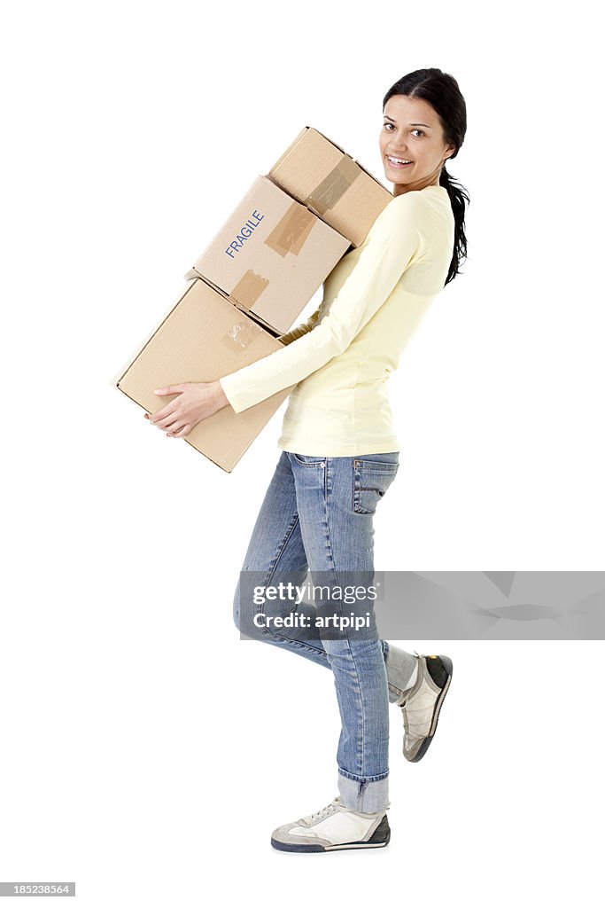 Woman carrying cardboard boxes