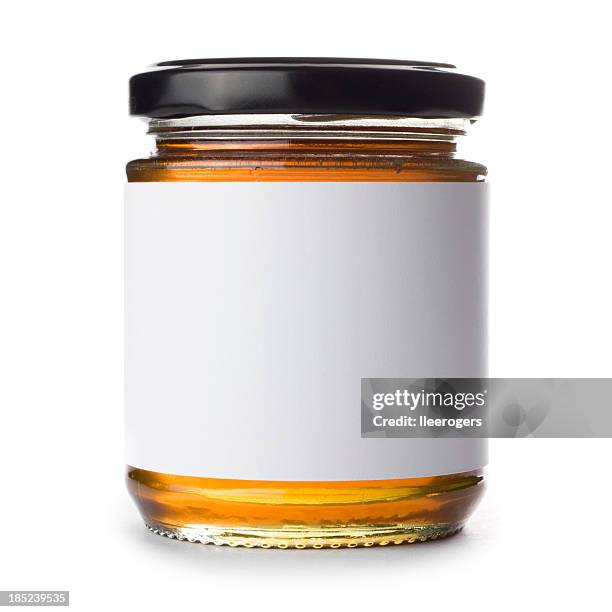 jar of honey with blank label on a white background - honey jar stock pictures, royalty-free photos & images