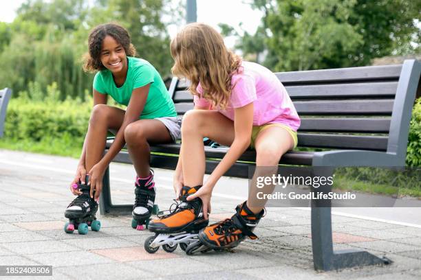 friends - tying shoelace stock pictures, royalty-free photos & images