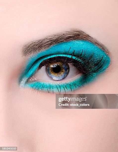 blue eye - extreme close up of bright blue eye and iris stock pictures, royalty-free photos & images