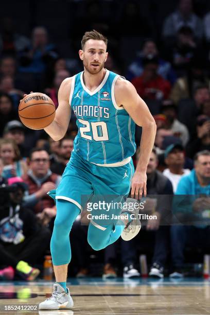 Gordon Hayward of the Charlotte Hornets brings the ball up court during the first quarter of their game against the Miami Heat at Spectrum Center on...