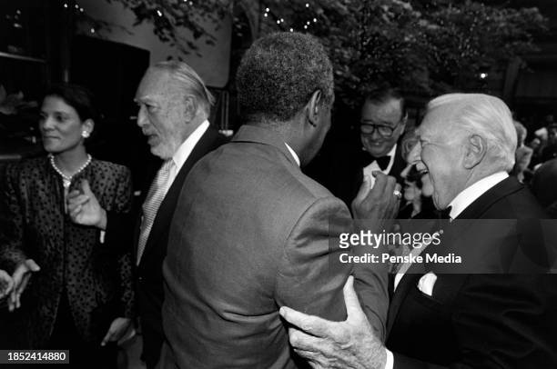 Kathy Benvin, Anthony Quinn, Bill Cosby , Sirio Maccioni, and Walter Cronkite attend the 25th-anniversary party at Le Cirque, a restaurant in New...