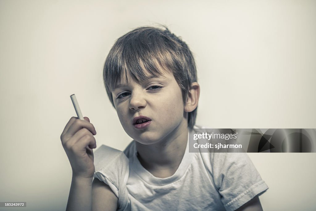 Young Boy with Cigarette in Hand, Shifty Eyes