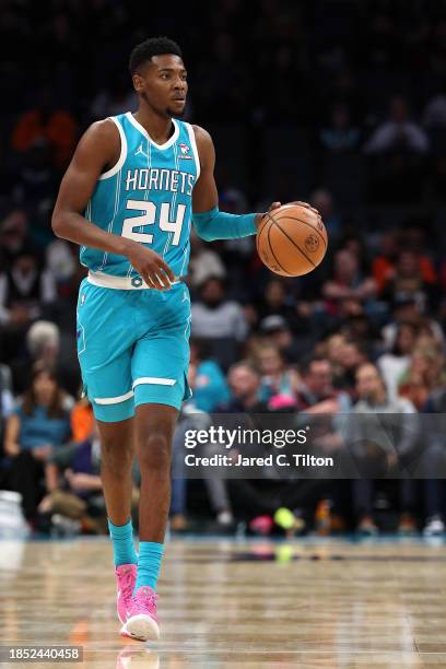 Brandon Miller of the Charlotte Hornets brings the ball up court during the first quarter of their game against the Miami Heat at Spectrum Center on...