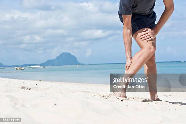 pain in achilles tendon - calf human leg stock pictures, royalty-free photos & images