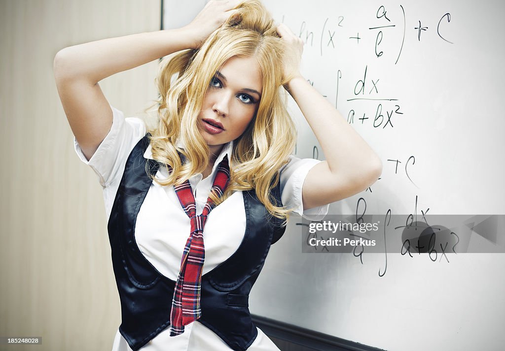 Beautiful young woman in classroom