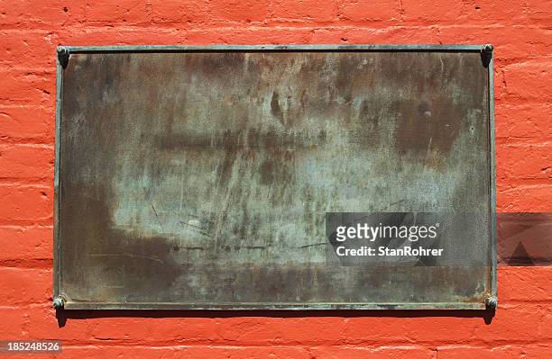blank metal sign on painted red brick - minnestavla bildbanksfoton och bilder