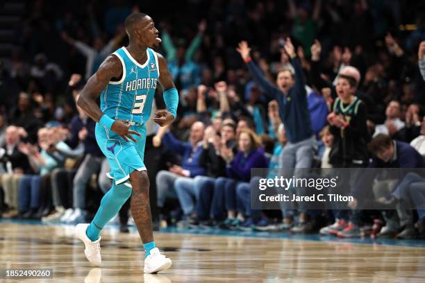 Terry Rozier of the Charlotte Hornets reacts following a three point basket during the second half of their game against the Miami Heat at Spectrum...