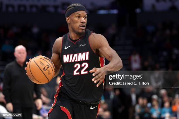 Jimmy Butler of the Miami Heat drives to the basket during the second half of their game against the Charlotte Hornets at Spectrum Center on December...