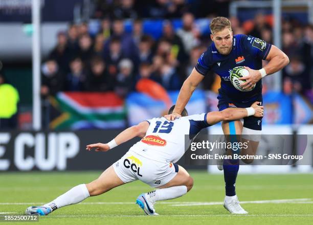 Edinburgh's Duhan van der Merwe and Castres' Adrien Seguret in action during an EPCR Challenge Cup match between Edinburgh Rugby and Castres...