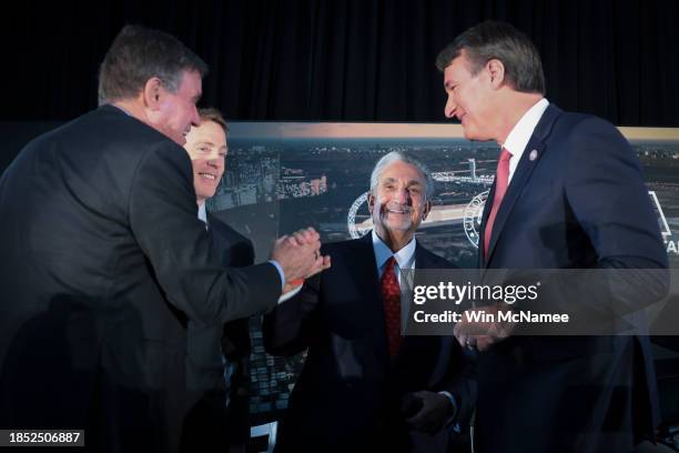 Monumental Sports & Entertainment CEO Ted Leonsis , celebrates with Sen. Mark Warner , Virginia Gov. Glenn Youngkin , and JBG Smith CEO Matt Kelly...