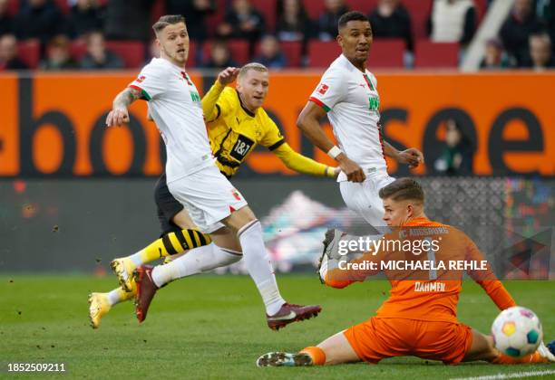 Dortmund's German forward Marco Reus tries to score during the German first division Bundesliga football match between Augsburg and Borussia Dortmund...